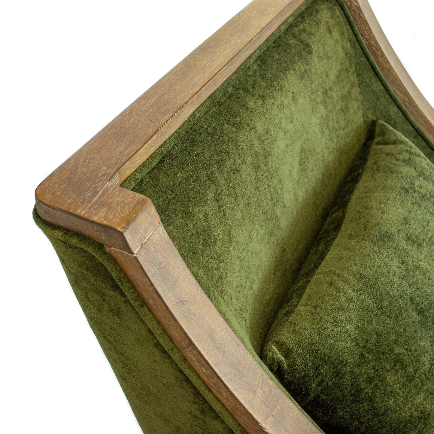 closeup of top features of green armchair